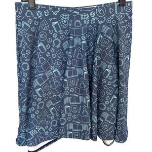 Paola's‎ Pixels Game Master skater skirt tabletop gaming dice books headset mark